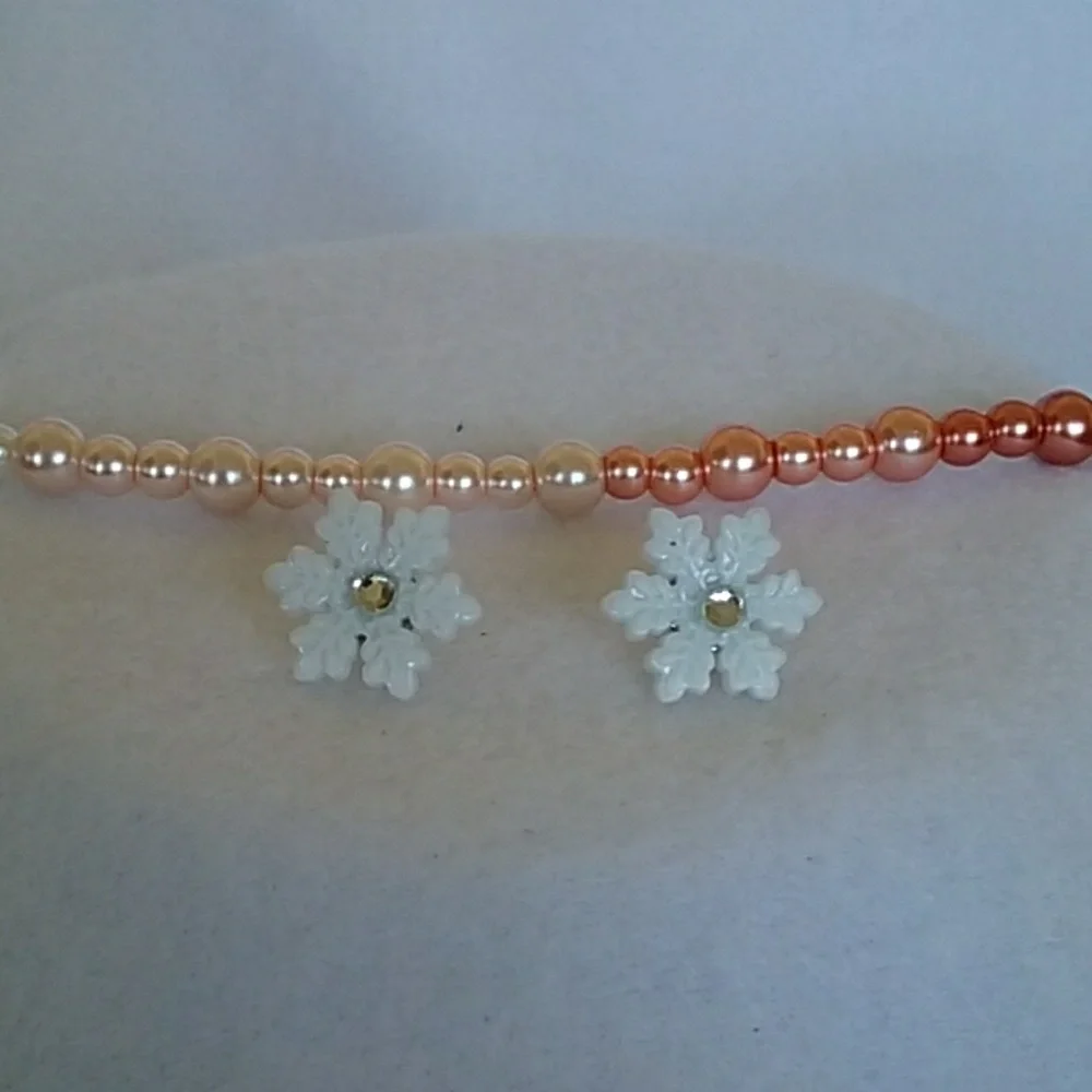 White acrylic snowflake post earrings